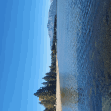 a view of a lake with mountains in the background