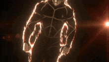 a man in a black suit with flames coming out of his arms