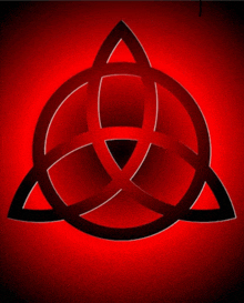 a red and black symbol with a triangle in the middle