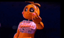 chica the chicken from five nights at freddy 's is waving at the camera in a dark room .