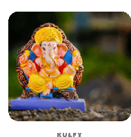 a statue of ganesha sits on a blue base with the word kulfy written below it