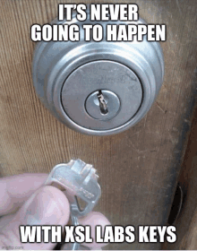 a person is holding a key in front of a lock that says it 's never going to happen with xsl labs