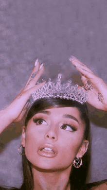 ariana grande wearing a tiara on her head