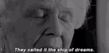 a black and white photo of an elderly woman 's face with the words `` they called it the ship of dreams '' .