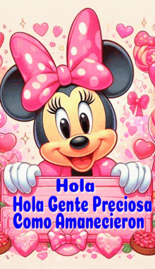 a picture of minnie mouse holding a sign that says " hola gente preciosa como amanecieron "