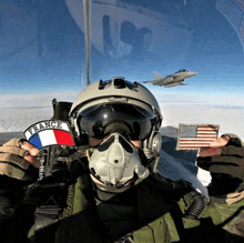 a man in a helmet with a patch that says france on it