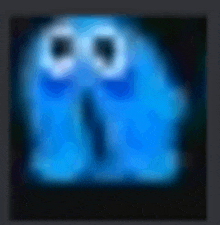 a blurry picture of a blue ghost with a black background .