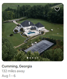 an aerial view of a large house and tennis court in cumming georgia