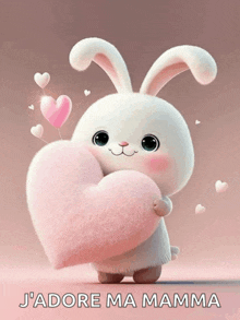 a bunny holding a pink heart with the words j'adore ma mamma written below it