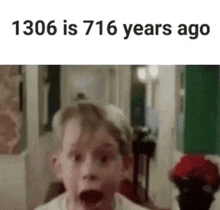 a boy is making a surprised face in front of a sign that says 1316 is 716 years ago .