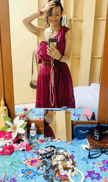 a woman taking a picture of herself in front of a mirror with a bottle of eau de toilette on the table