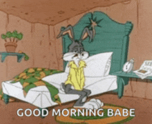 a cartoon of bugs bunny sitting on a bed with the words good morning babe above him