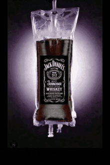 a bag of jack daniel 's tennessee whiskey hanging from a syringe