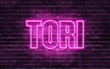 a neon sign with the name tori on it