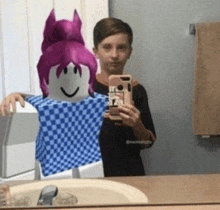 a boy is taking a selfie in a bathroom with a roblox character .