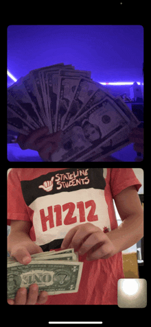 a person wearing a shirt that says h1212 is holding a stack of money