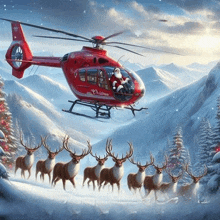 a red helicopter with christmas written on the side