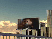 a billboard with a chipmunk on it in front of a city