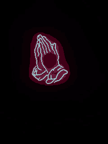 a neon sign of a person 's praying hands on a black background