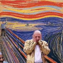 a man in a gold jacket covers his ears in front of a painting