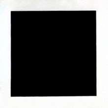 a black square on a white background with a white frame .