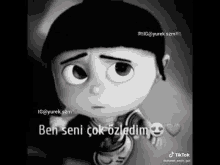 a black and white photo of a cartoon character with a sad face and the words `` ben seni çok özledim '' .