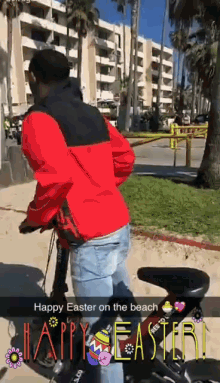 a man in a red jacket is riding a bike with the words happy easter on the beach above him