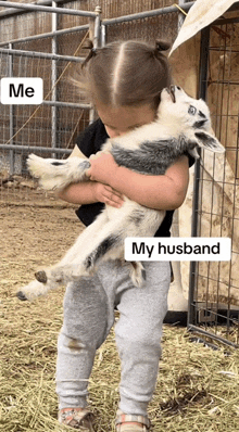 a little girl is holding a baby goat with a caption that says " my husband "