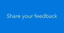 a blue sign that says share your feedback on it