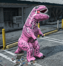 a man in a pink inflatable dinosaur costume is standing in a parking lot