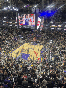 a basketball game is being played in a stadium that says delta center