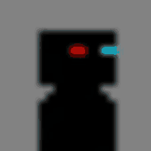 a blurred image of a black cube with red and blue eyes .