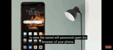 a screenshot of a phone with the words to view the saved wifi password open the browser of your phone below it