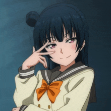 a girl in a school uniform with an orange bow holds her hand to her forehead