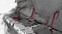 a black and white drawing of a piano with blood coming out of it