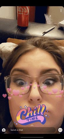 a woman wearing glasses and a chill time filter