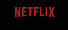 the netflix logo is red and black on a black background .