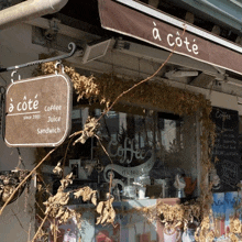 a sign for a cafe called a cote