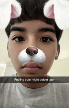 a boy with a cat face and the words feeling cute might delete later on the bottom