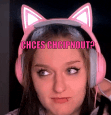 a woman wearing pink cat ears and headphones with the words chces chcipnout written above her