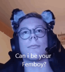 a man wearing glasses and ears with the words `` can i be your femboy '' written on it .