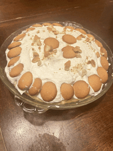 a banana pudding pie with whipped cream and banana slices