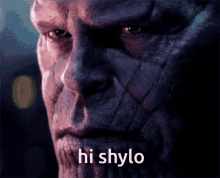 a close up of thanos ' face with the words hi shylo written below it