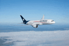 an aeromexico airplane is flying through the air