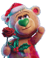 a teddy bear wearing a santa hat holds a rose