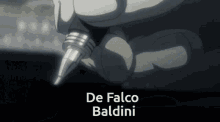 a close up of a person holding a pen with the name de falco baldini