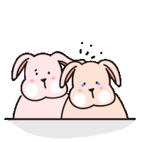 two pink rabbits are standing next to each other .