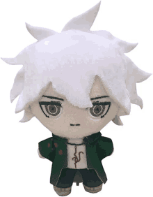 a stuffed animal with white hair and a green jacket has the letter s on his shirt