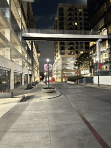 a bridge over a street with a sign that says ' do not enter '