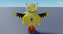 the back of a roblox character wearing a yellow shirt with a h on it